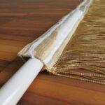 Fadenvorhang GARDA in messing nach Mass mit Öffnung für Vorhangstange.