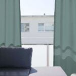 Outdoor-Vorhang als moderne Alternative zu herkömlicher Sonnenstore.