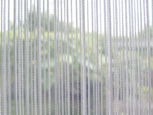 Insektenschutz-Vorhang reinigen - weisser Fliegenvorhang