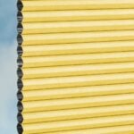 Stoffmuster vom Wabenplissee DUETTE® EOS® FIXÉ UNIX DARK in Gelb [7484]