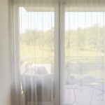Tagesvorhang FREIBURG in Hellgrau [091] - Raumansicht