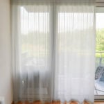 Tagesvorhang VARESE in Grau [092] - Raumansicht